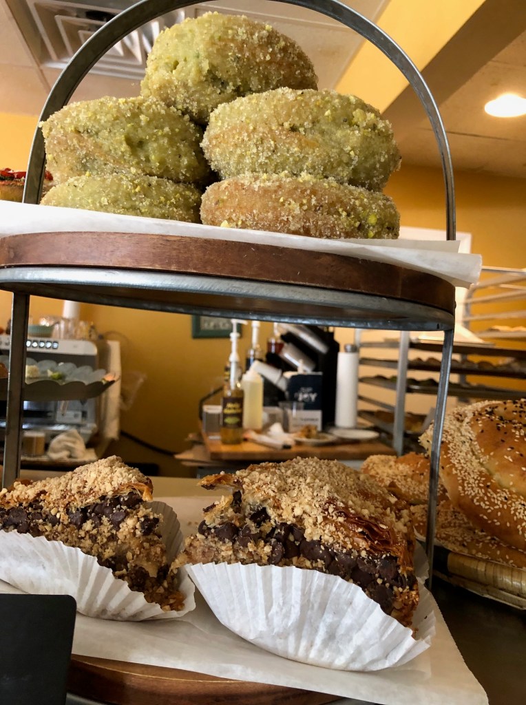 Pistachio donuts on top, that chocolate hazelnut baklava below